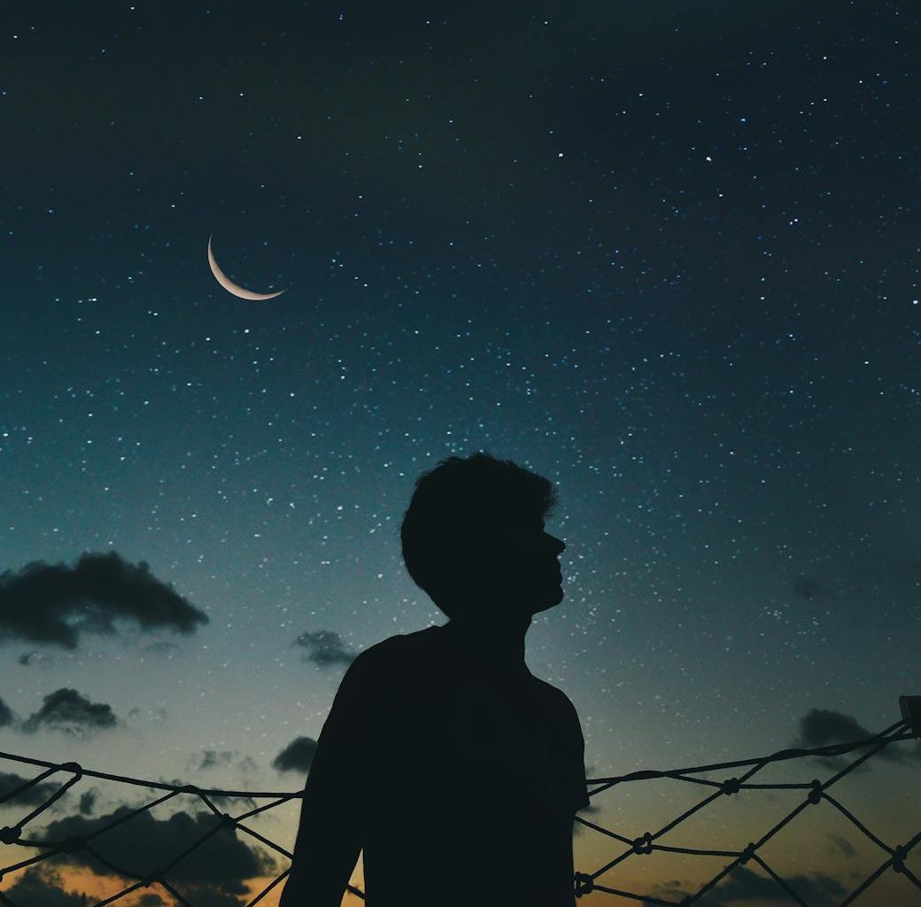 silhouette of man during nighttime