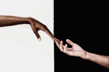 hands in front of white and black background